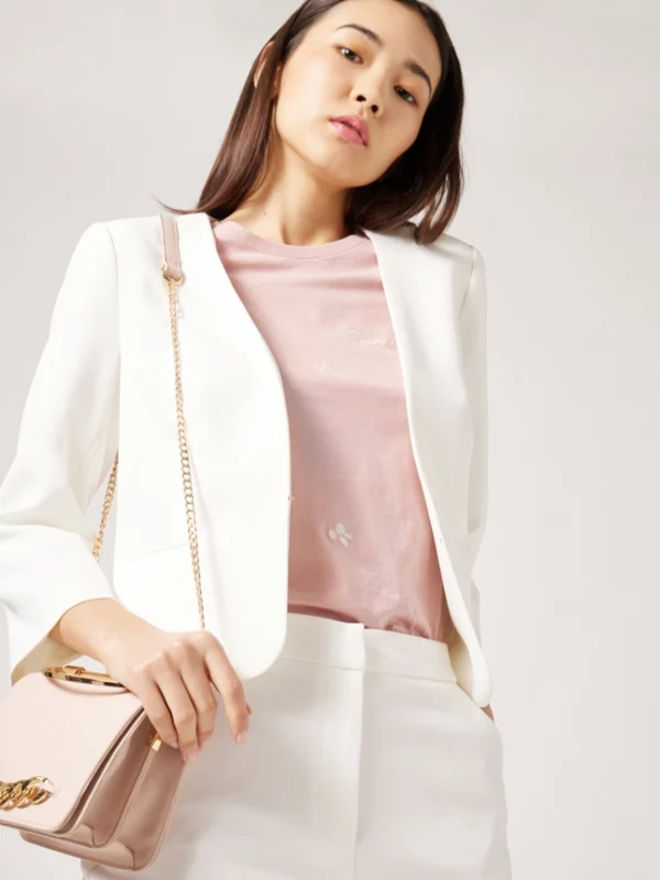 veste-blanche-ceremonie-nafnaf